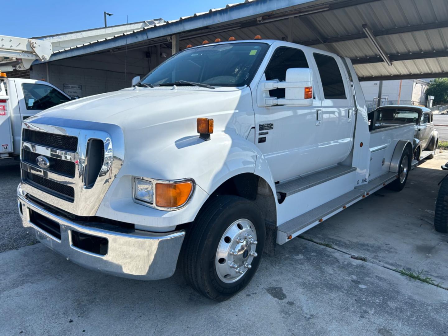 2011 White Ford F-650 Crew Cab 2WD DRW (3FRNW6FG2BV) with an 6.7L L6 DIESEL CUMMINS engine, Automatic transmission, located at 1687 Business 35 S, New Braunfels, TX, 78130, (830) 625-7159, 29.655487, -98.051491 - Photo#0